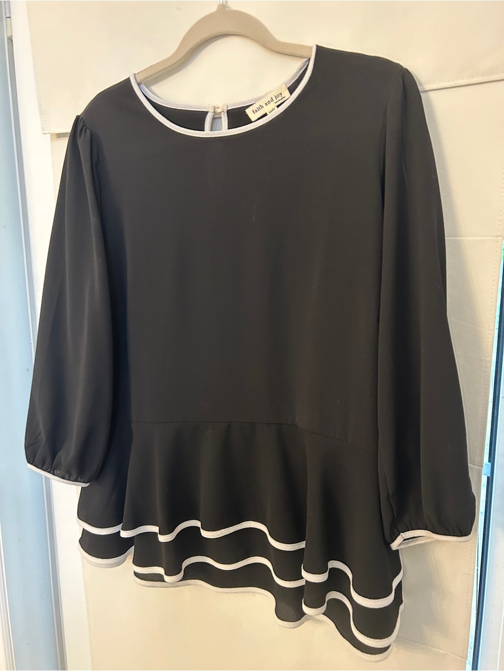 Faith and Joy Black Peplum Blouse with White Trim Accents